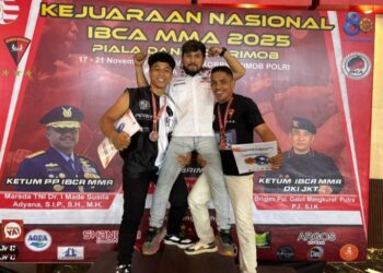 Momen kedua Atlet dan Sekretaris Umum IBCA MMA Provinsi Gorontalo saat rayakan kemenangan