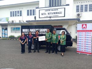 Pemkot Kotamobagu Terima Bantuan Mobil Sampah dari Alfamidi