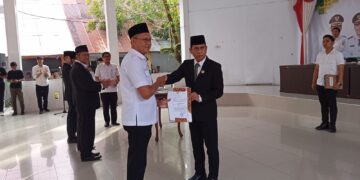 Penyerahan Surat perintah Pelaksana Tugas Kepala Inspektorat Daerah Kotamobagu