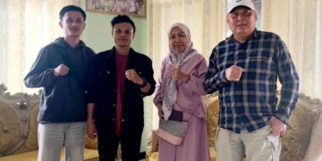 Rahman Patingki (kemeja hitam)